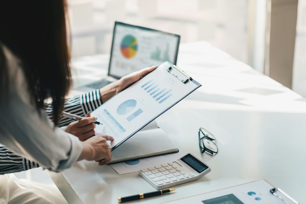 Business People Meeting to discuss and brainstorming the financial report paperwork in home office